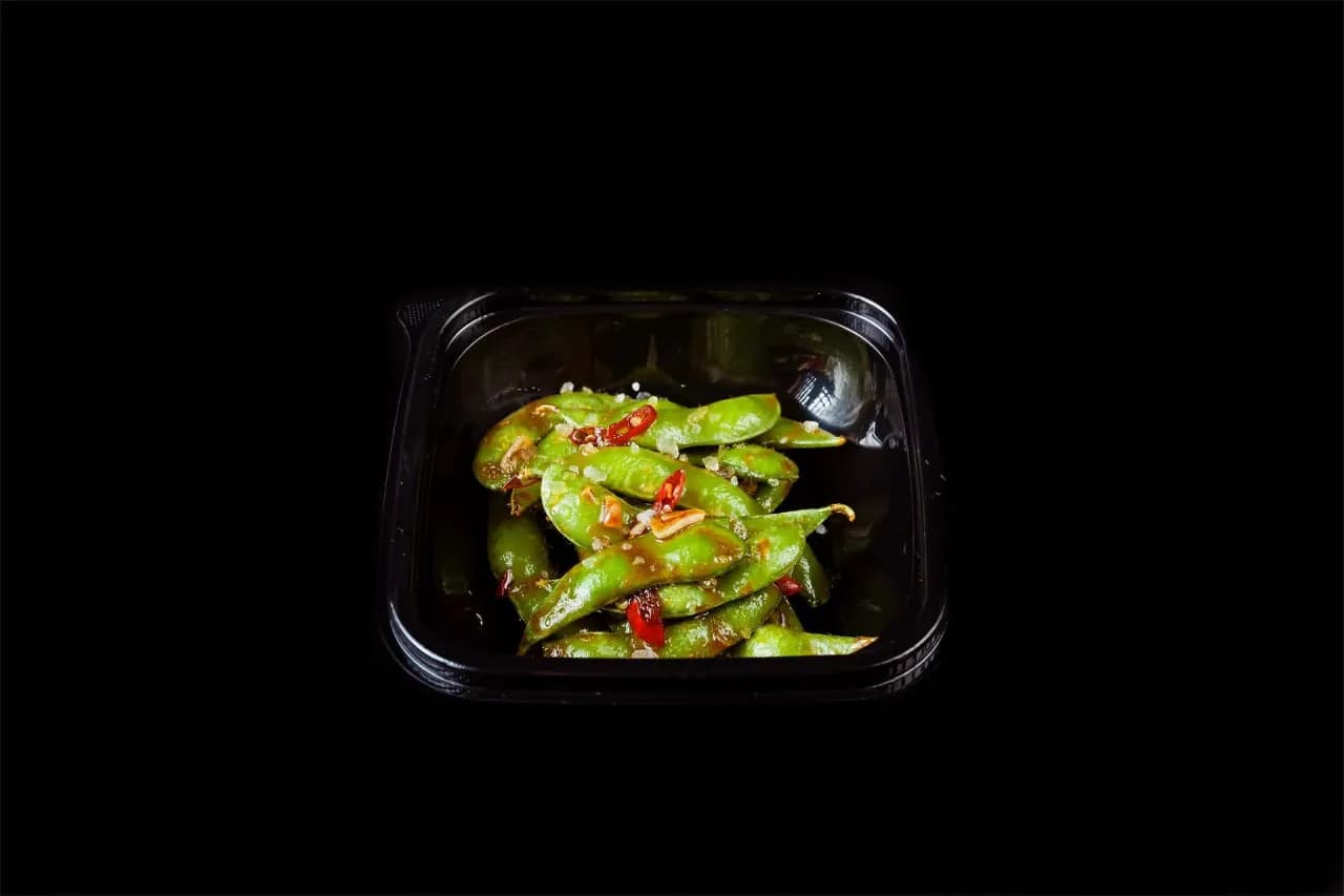 Edamame beans in hot sauce